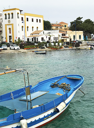 Small boat for tourists in the seaside resort of Mondello